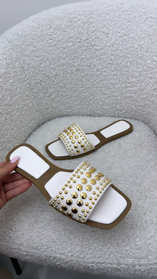 VIDA white slide sandals with gold button detail