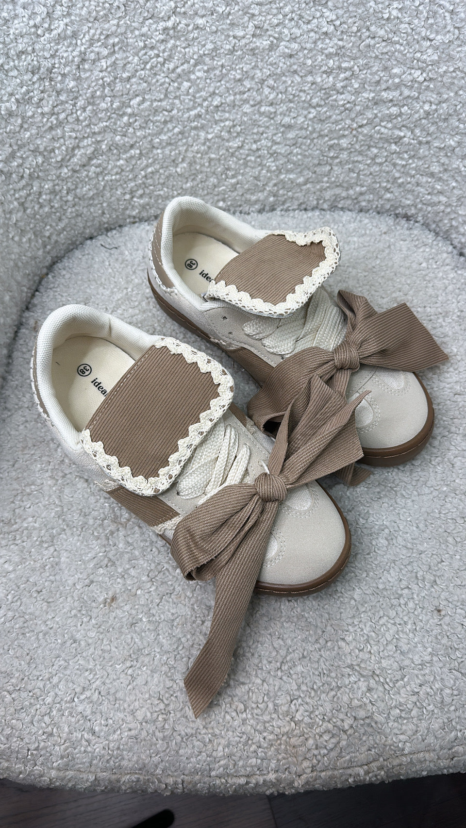 PHOENIX beige and cream bow detail trainers