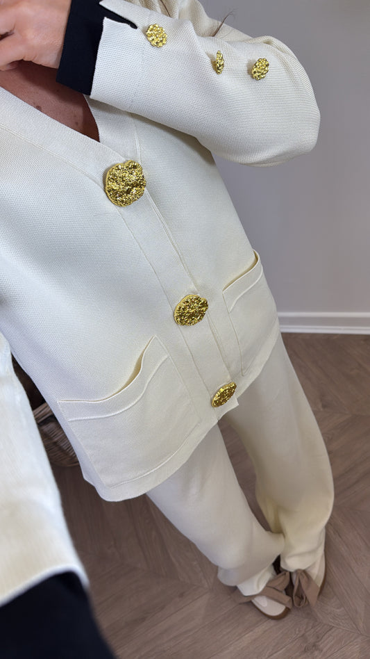 ETTA cream knitted gold button cardigan with black contrast cuff's and wide leg trousers co-ord