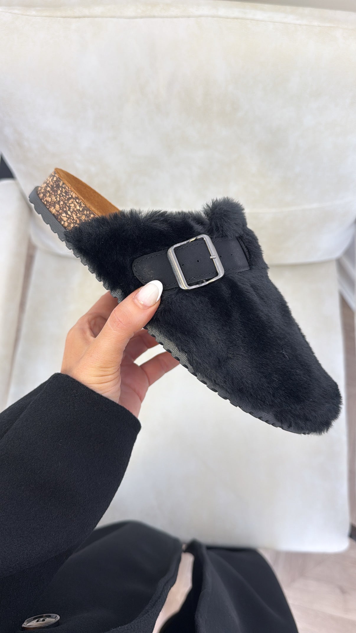 ASPEN black faux fur mules with buckle detail