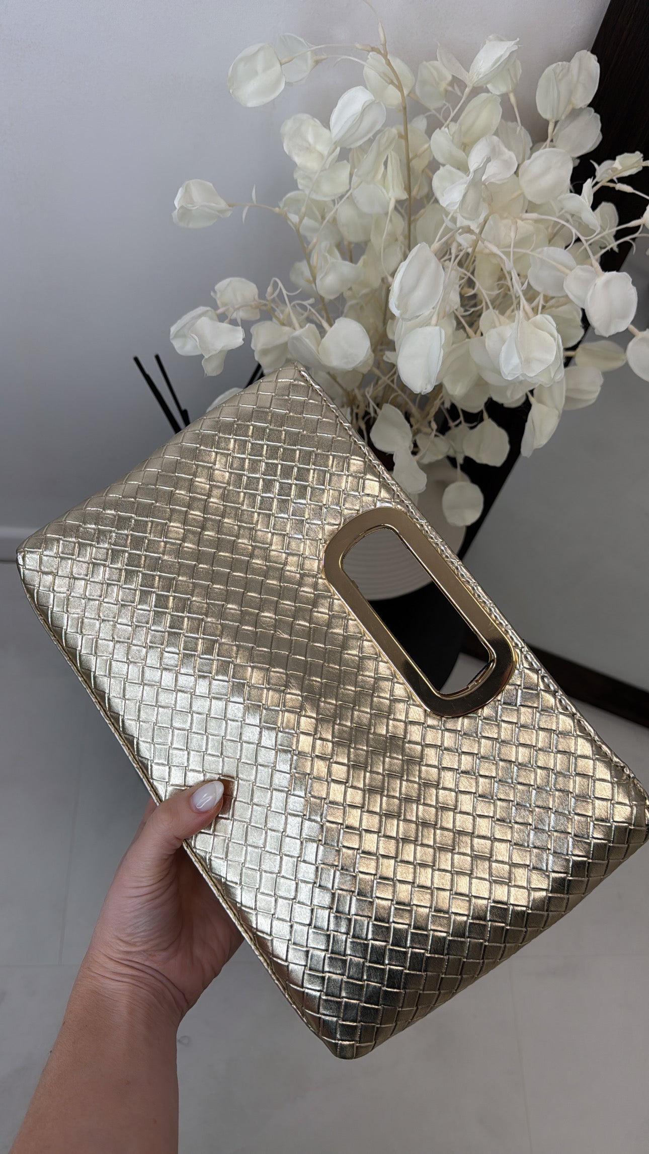 ANI gold clutch bag with gold detail
