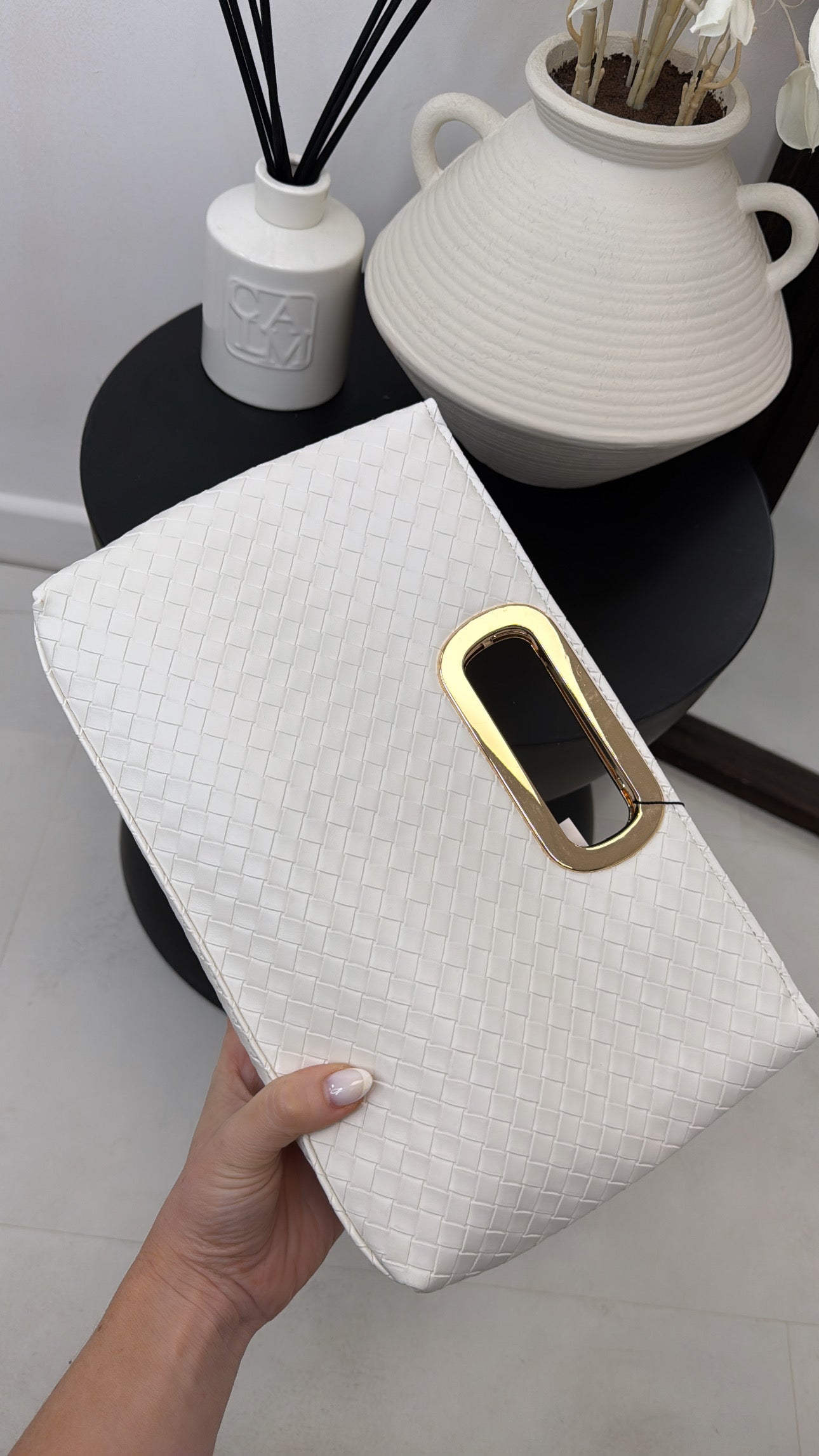ANI white woven clutch bag with gold detail