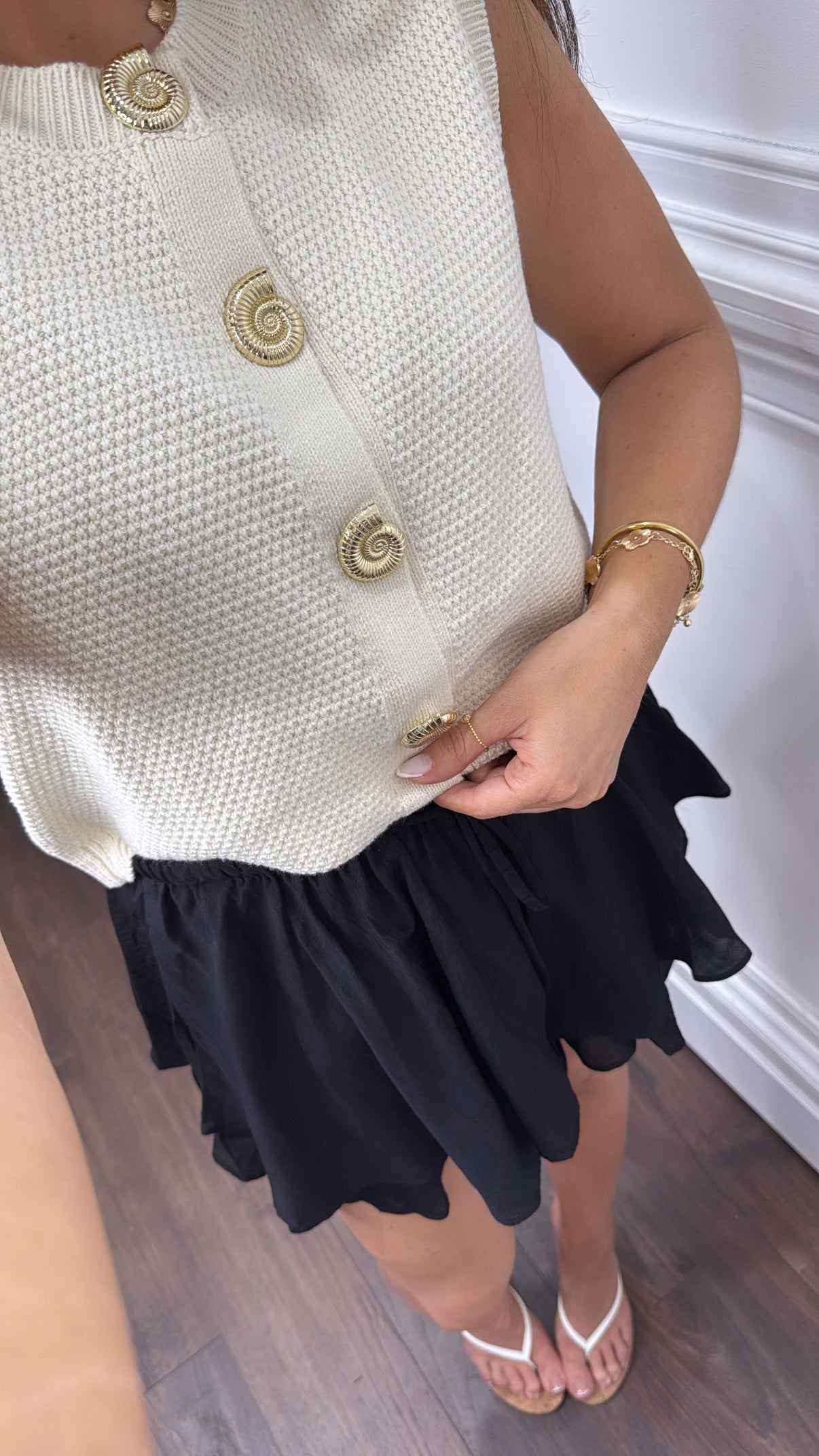 SHELLEY cream sleeveless cardigan with gold shell buttons