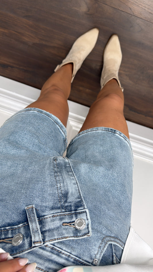 PORTER mid wash denim asymmetric shorts