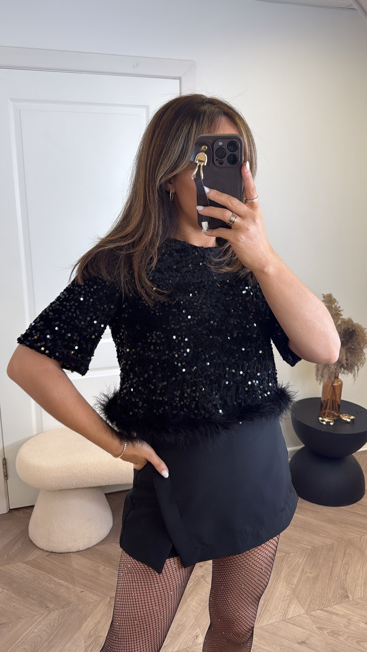 CHRISSY black sequin top with fluffy hem