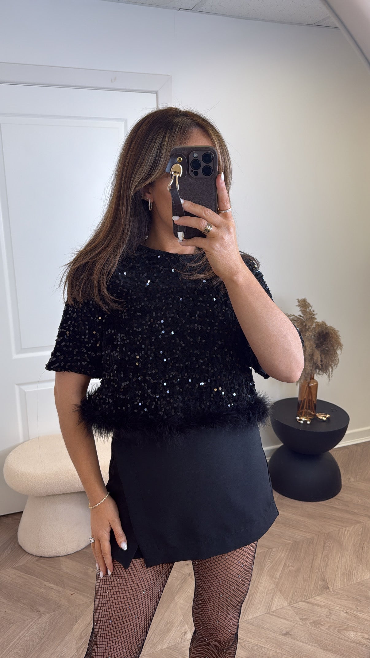 CHRISSY black sequin top with fluffy hem
