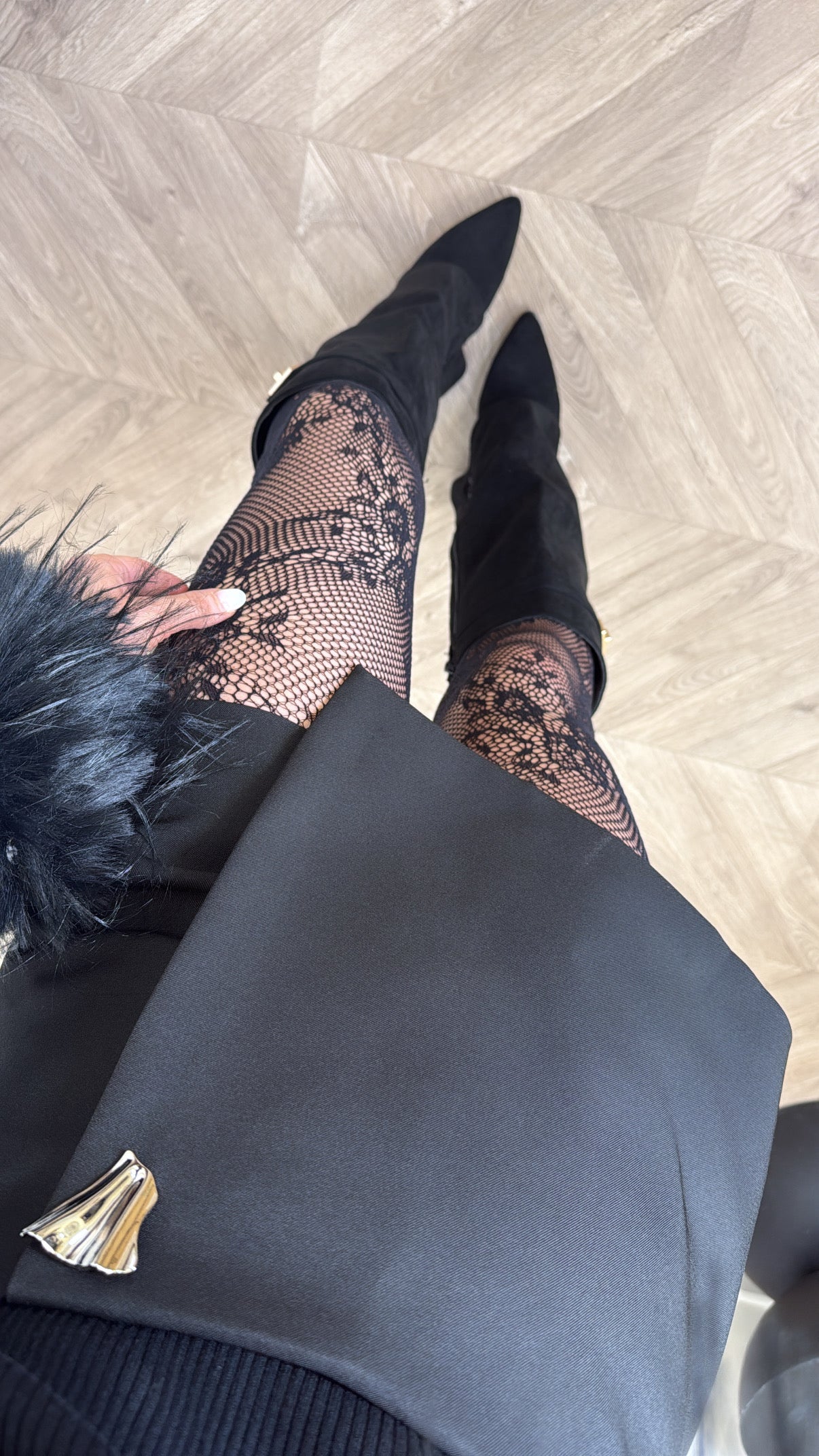 RAE black skort with gold hardware detail