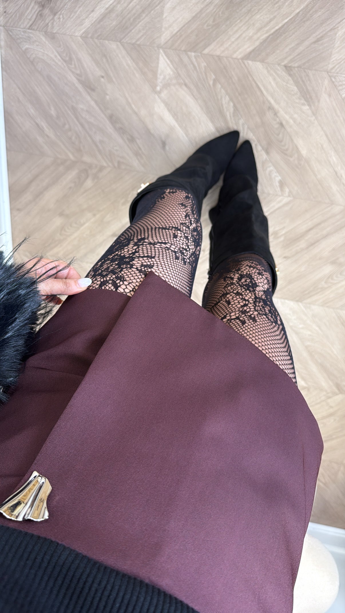 RAE burgundy skort with gold hardware detail