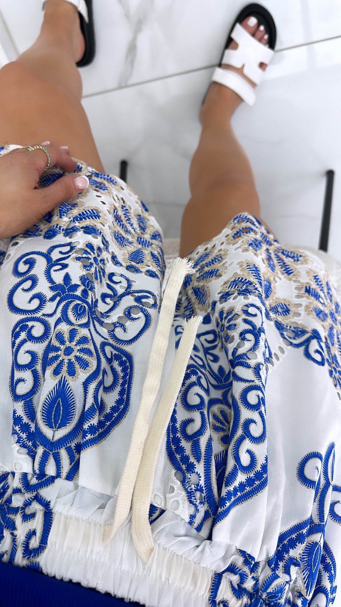 RAYA white broderie anglaise shorts with blue print