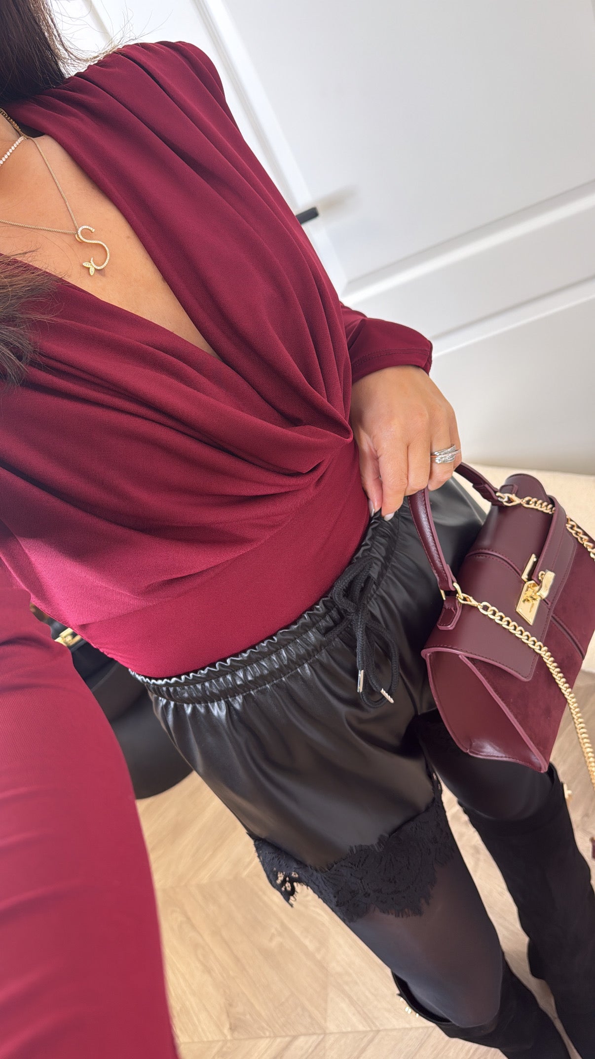 BROGAN burgundy drape neck top with shoulder pads