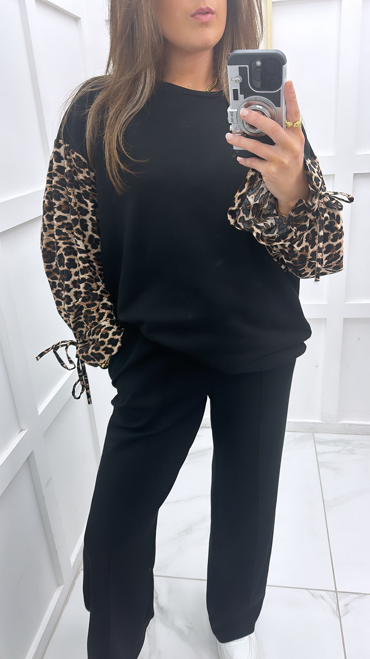 ESME black sweatshirt with leopard print sleeves