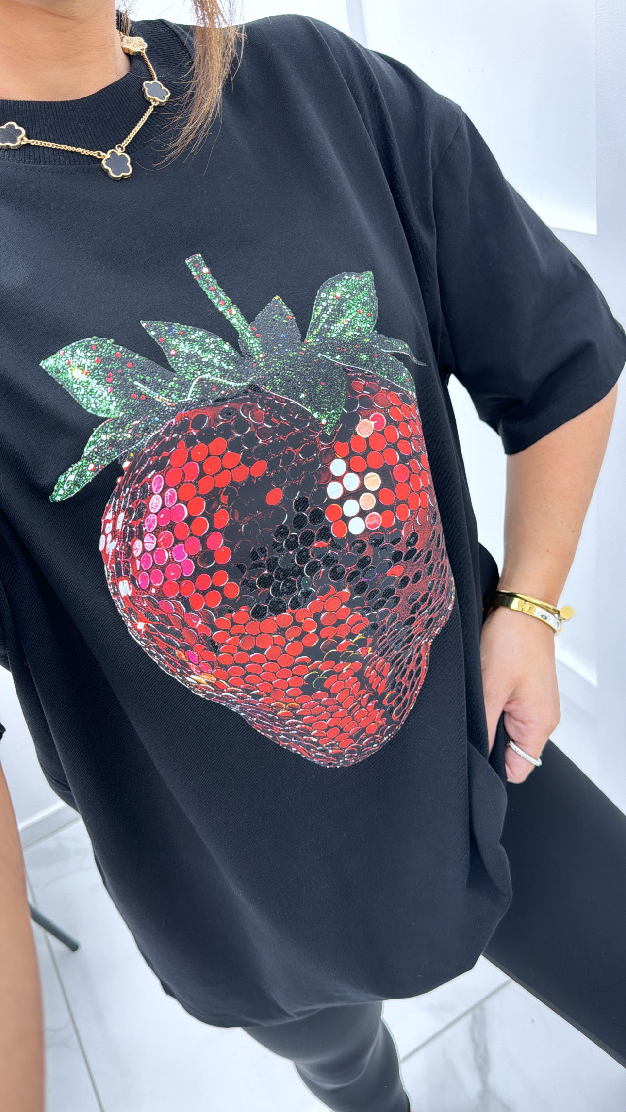 SASHA black oversize t-shirt with sequin strawberry design