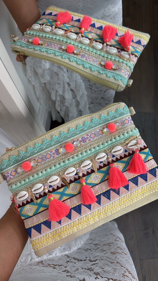 SHELBY neon pink pom pom and shell clutch bag