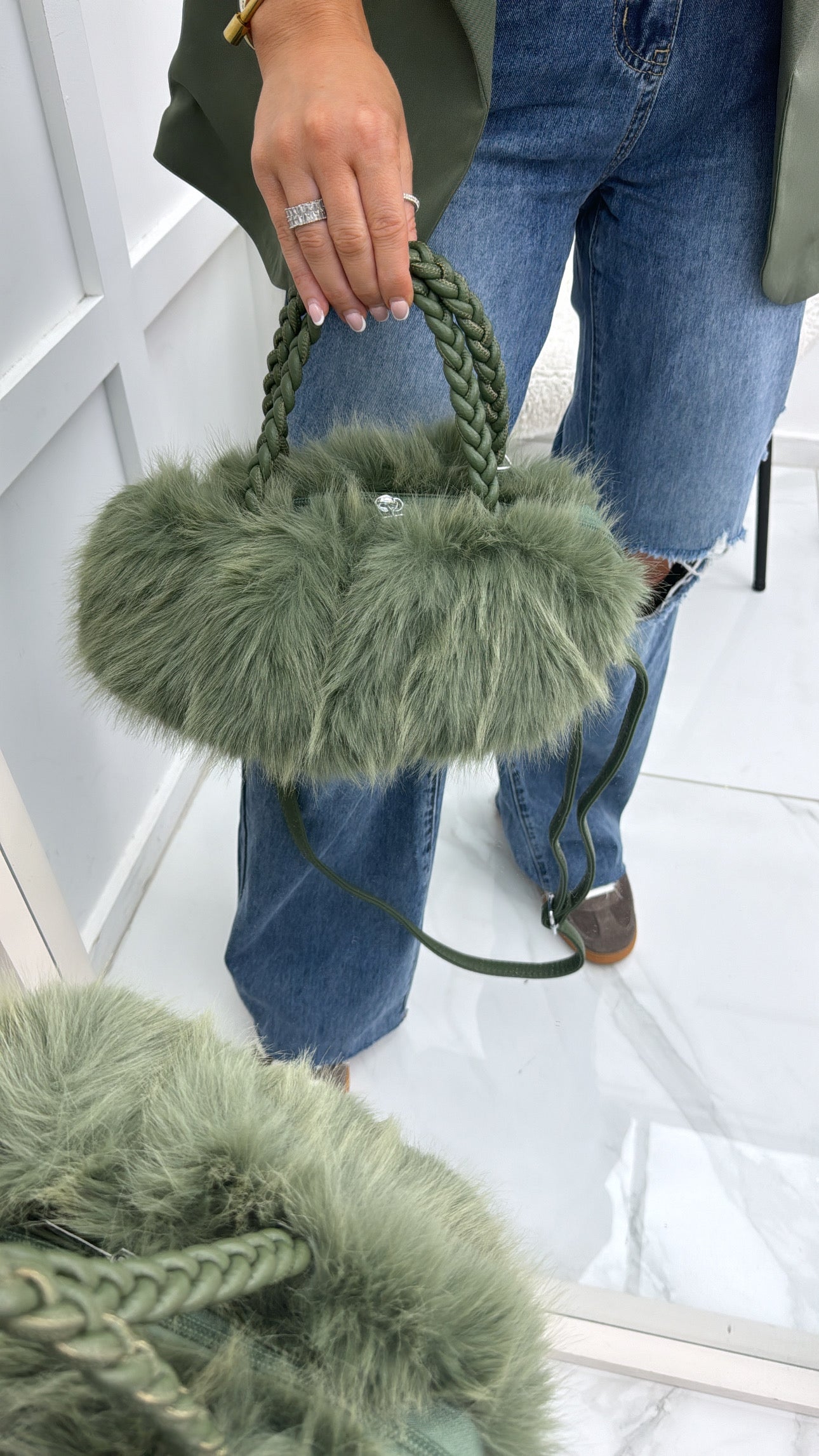 STELLA green faux fur grab bag with plait handles