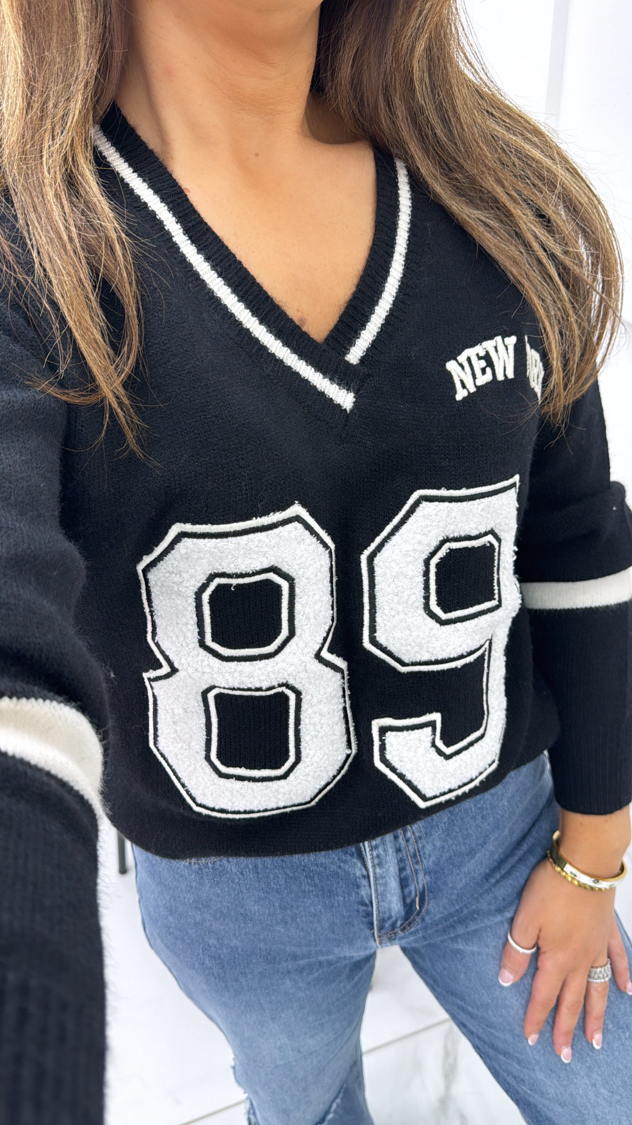 89 NEW YORK black jumper with teddy detail