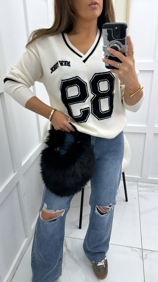 89 NEW YORK cream jumper with teddy detail