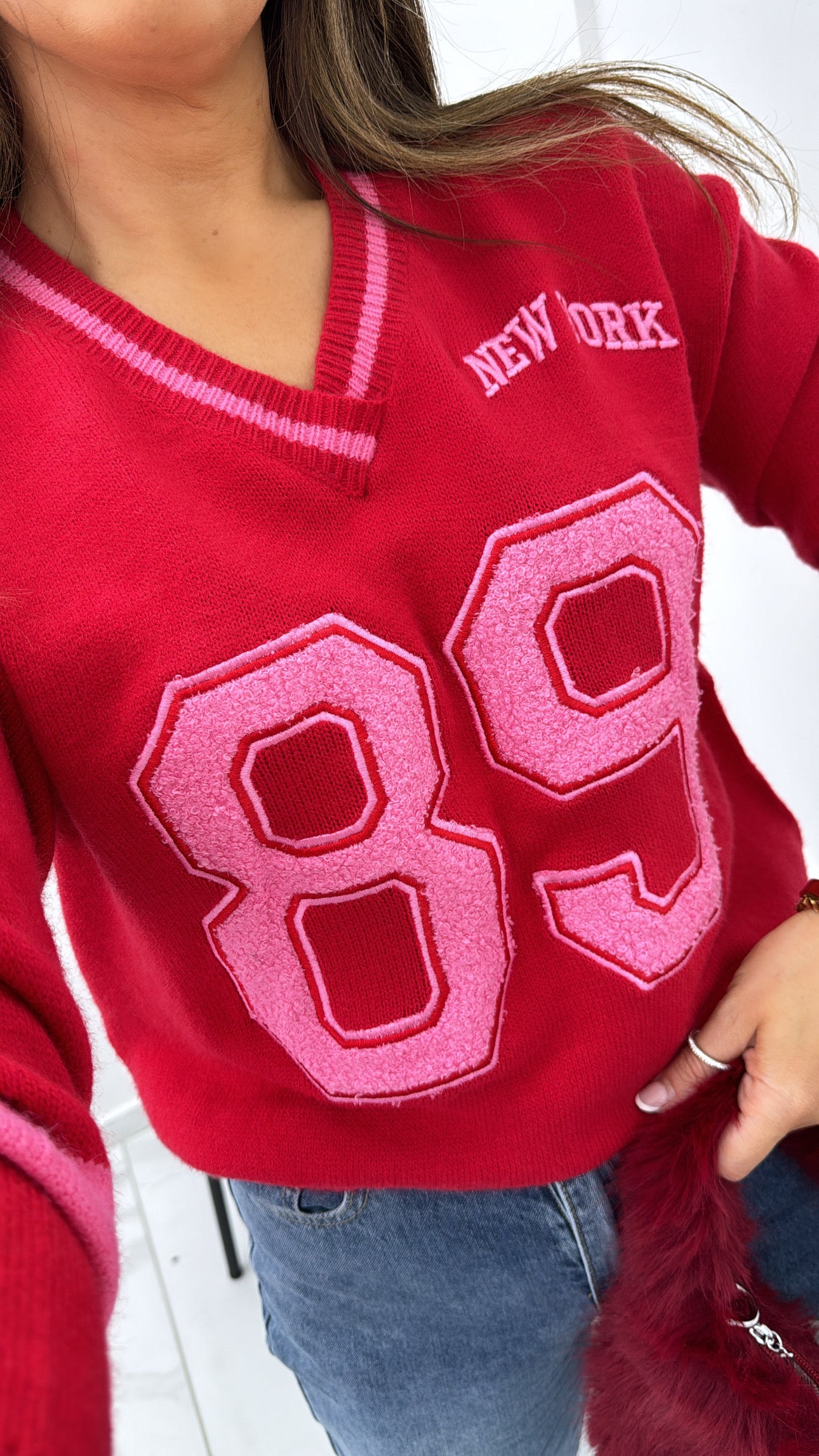 89 NEW YORK red jumper with teddy detail