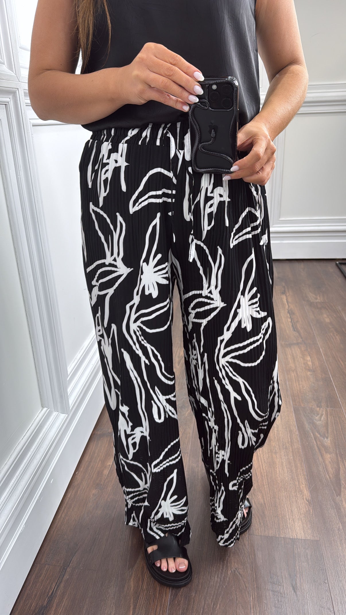 AVA black abstract print plisse wide leg trousers