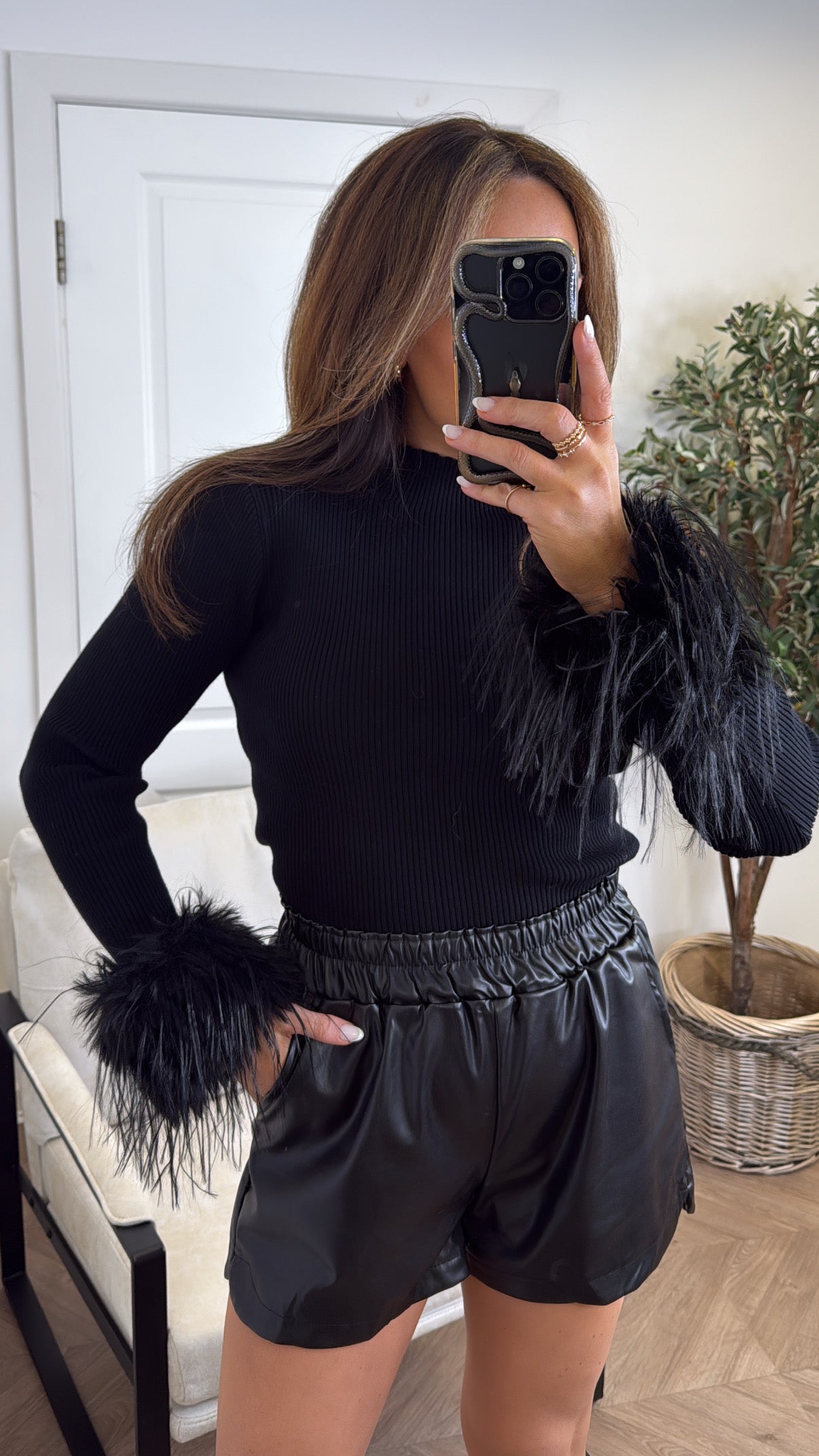 MILLY black ribbed top with fluffy cuffs