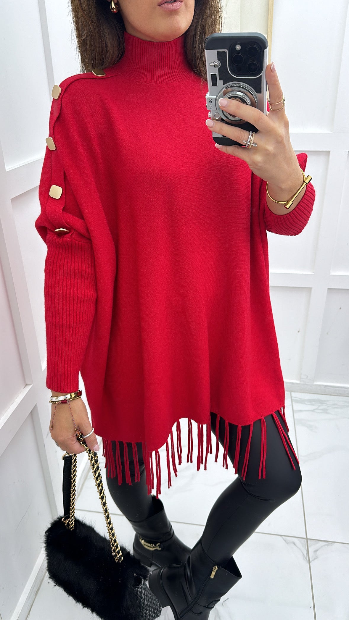 CORINA red poncho style jumper with tassels and gold buttons