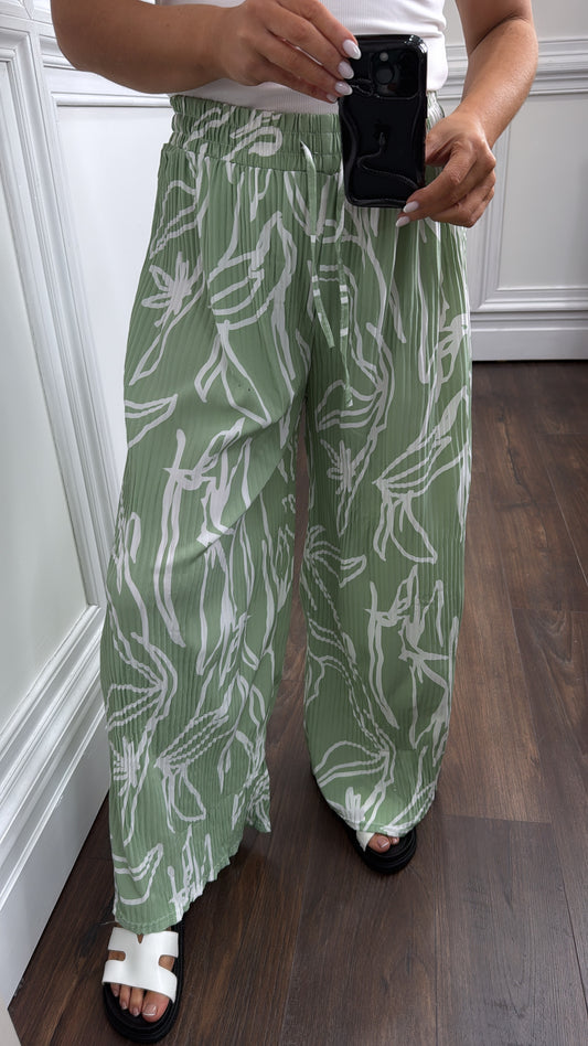 AVA green abstract print plisse wide leg trousers