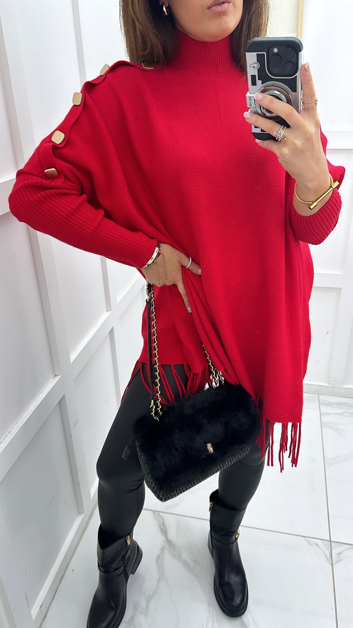 CORINA red poncho style jumper with tassels and gold buttons