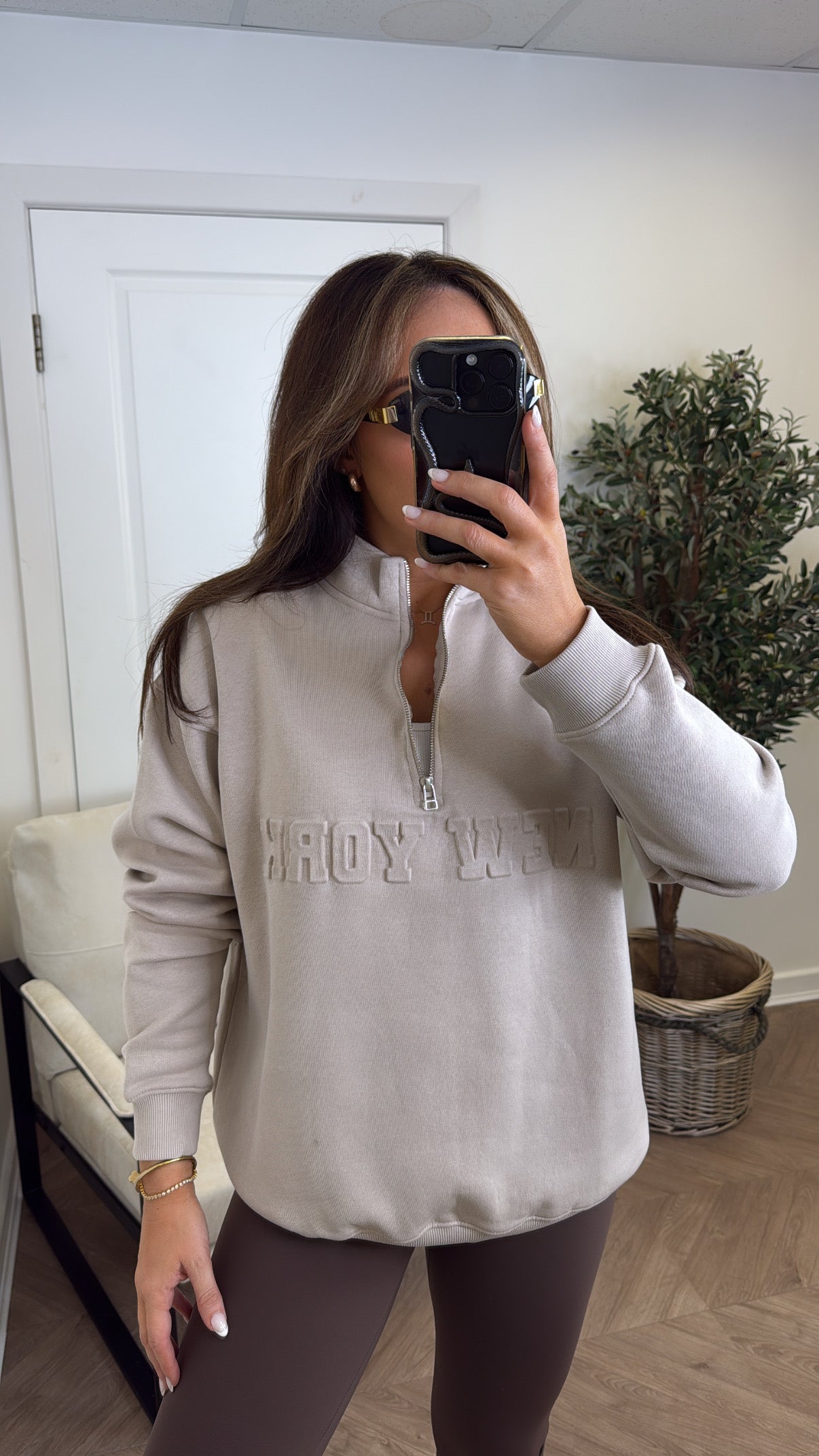NEW YORK beige embossed logo half zip oversized sweatshirt