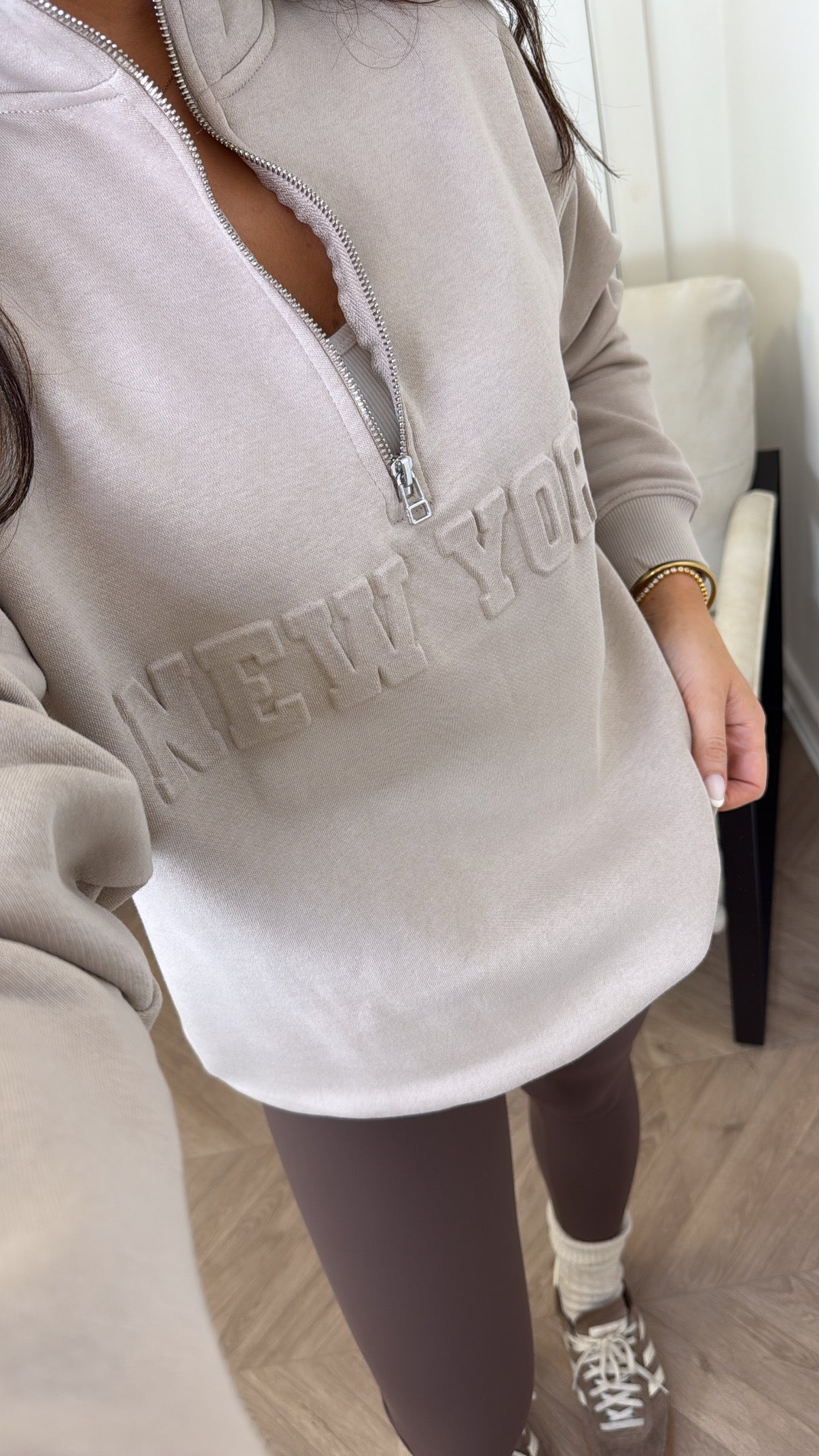 NEW YORK beige embossed logo half zip oversized sweatshirt