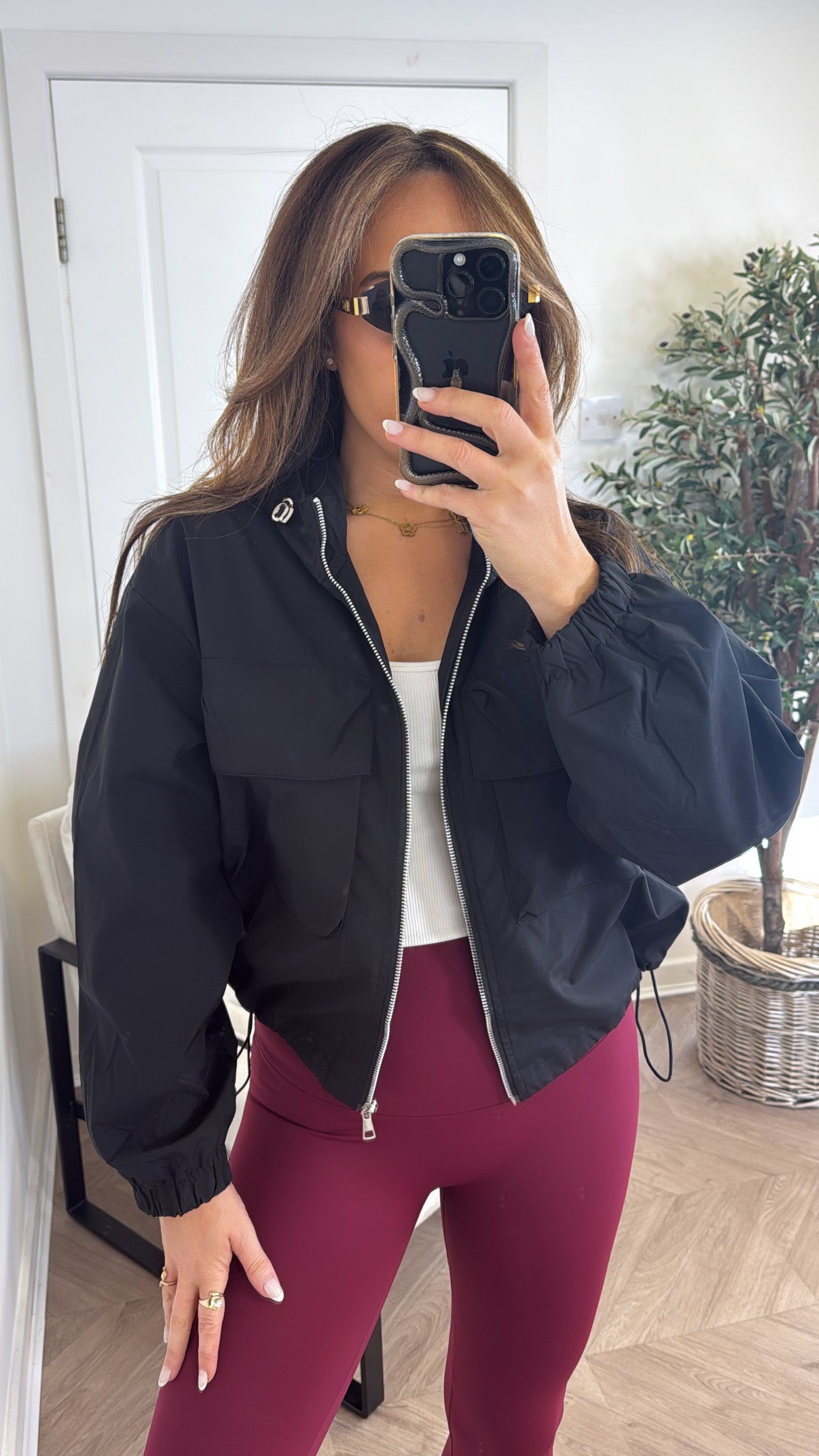 SIA black hooded windbreaker jacket