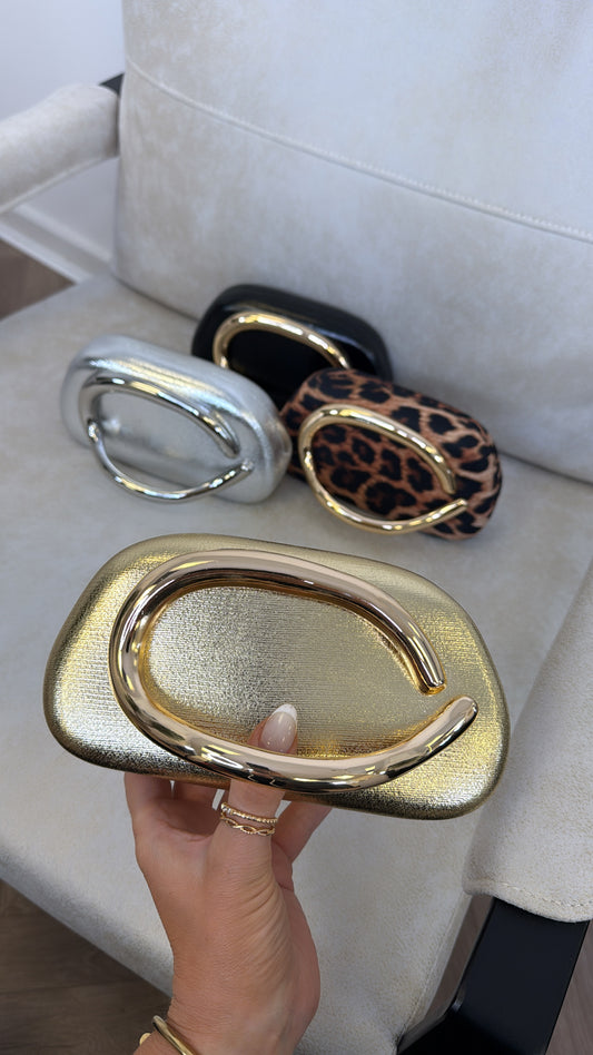 CASSY gold metallic grab bag with hardware handle