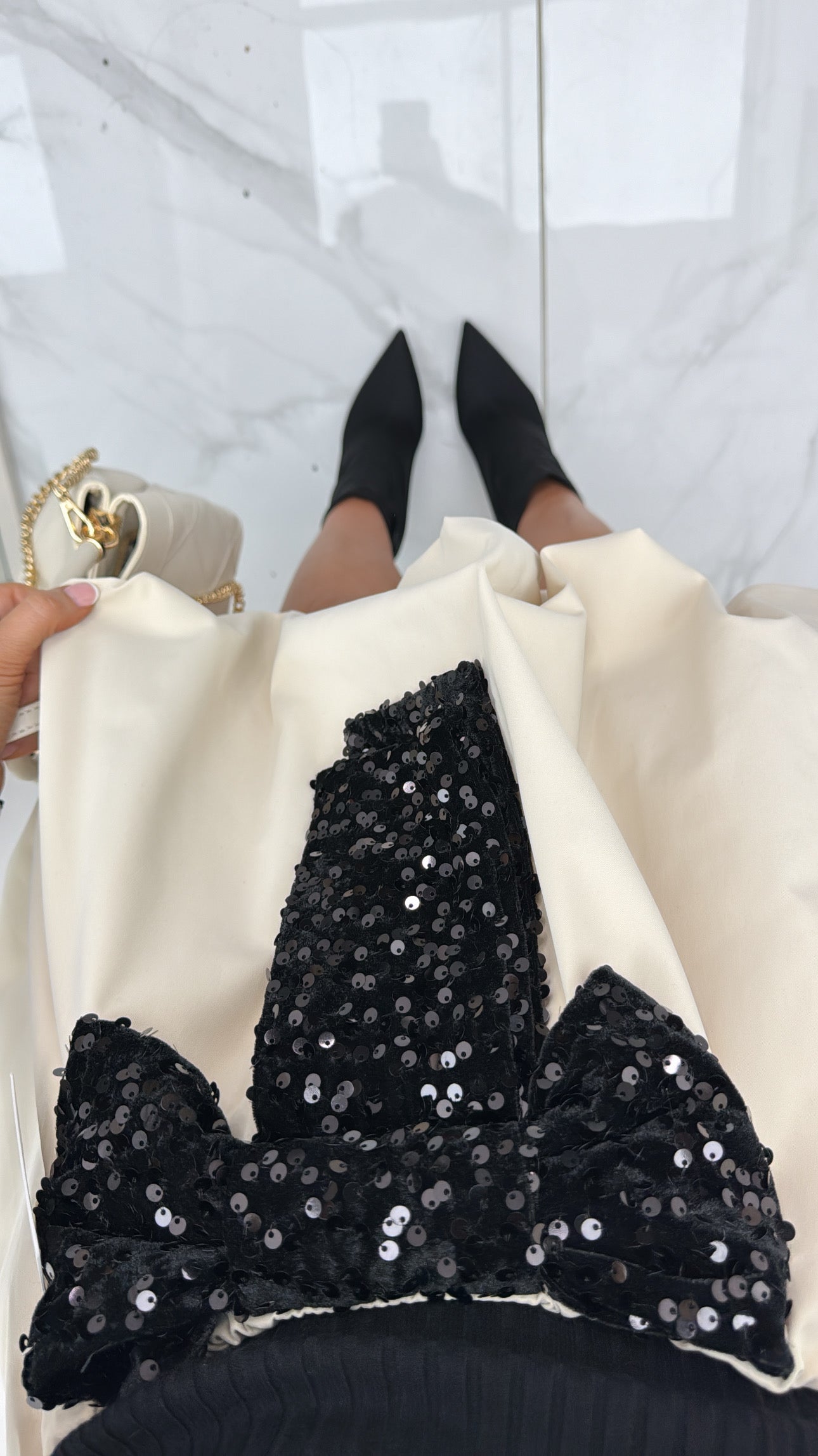 KLAUDINE beige puff ball skirt with black sequin bow