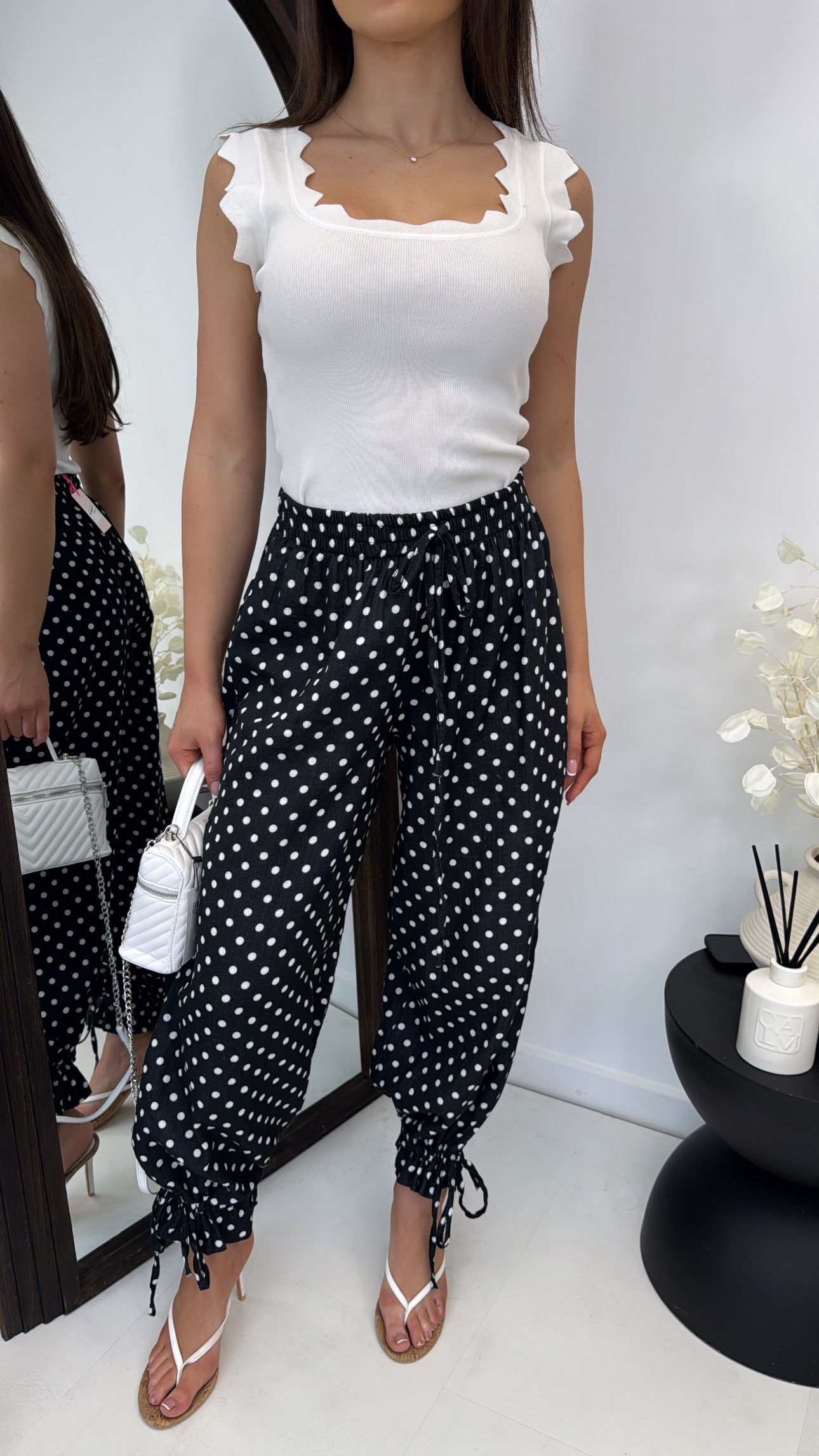 KAYA black polka dot balloon trousers