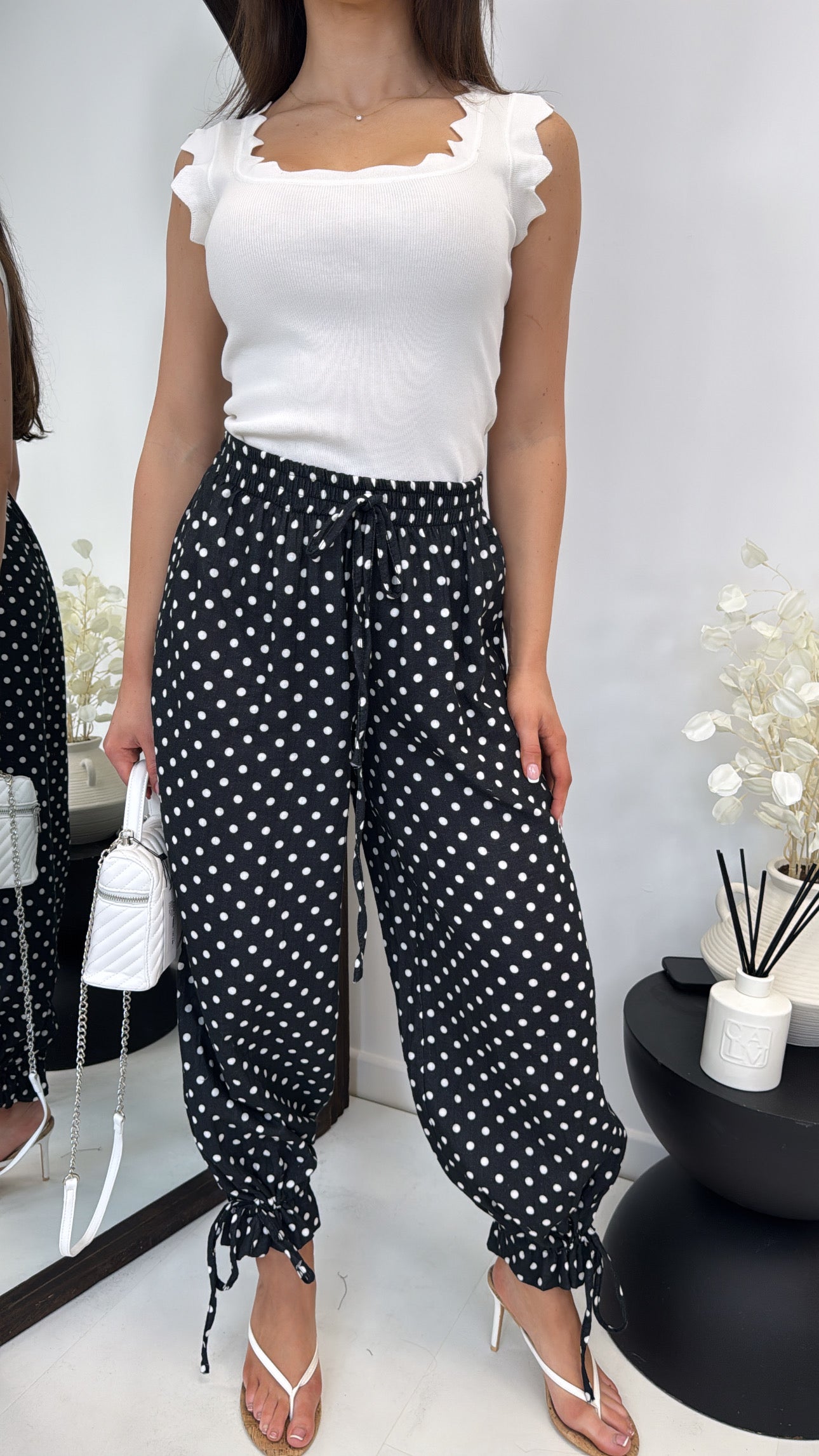 KAYA black polka dot balloon trousers