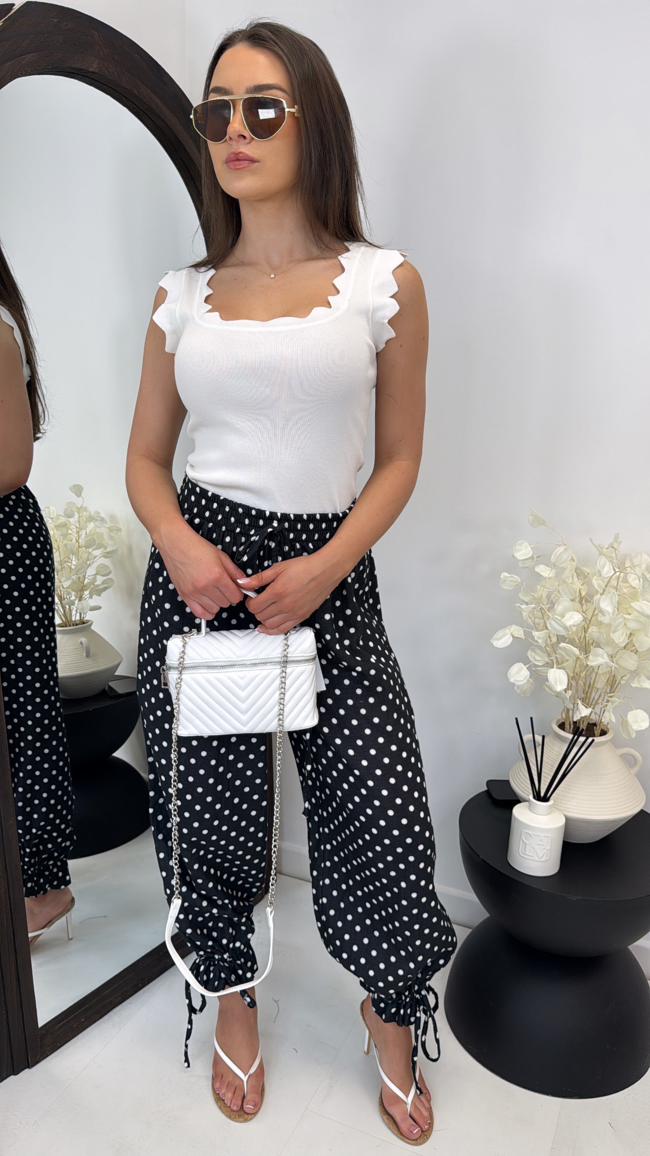 KAYA black polka dot balloon trousers