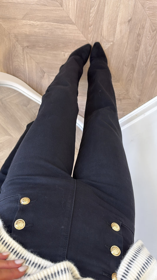 ISABELLE black stretchy flare jeans with gold button detail