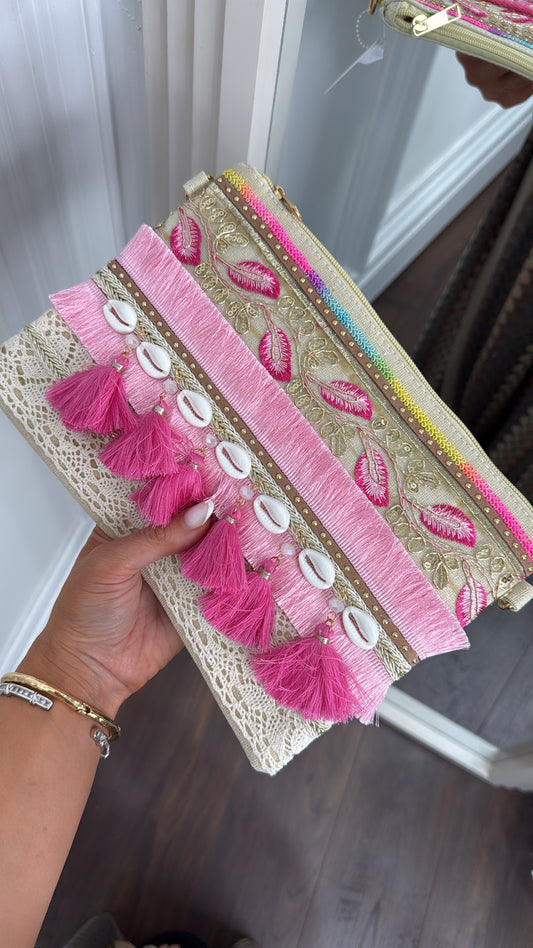 SHELBY pink shell and pom pom clutch bag