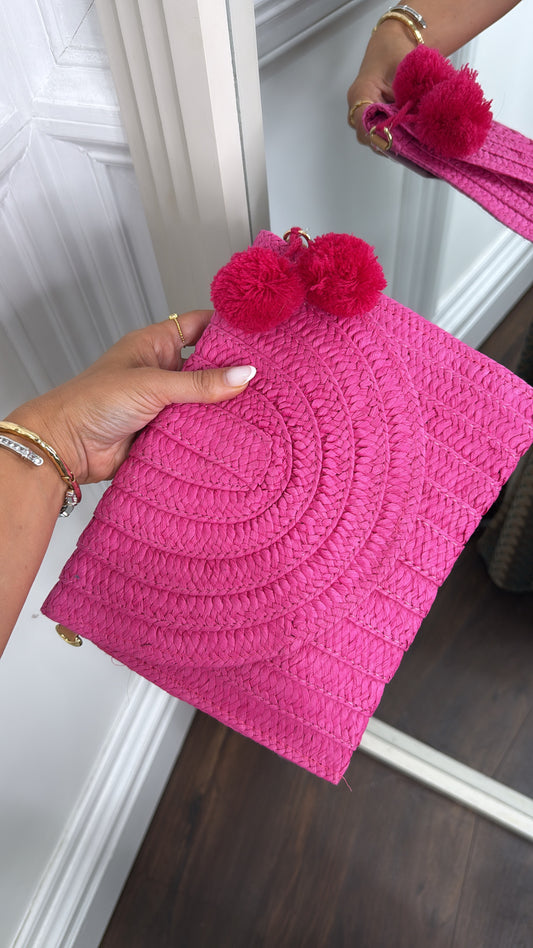 AURORA fuchsia pink straw clutch bag