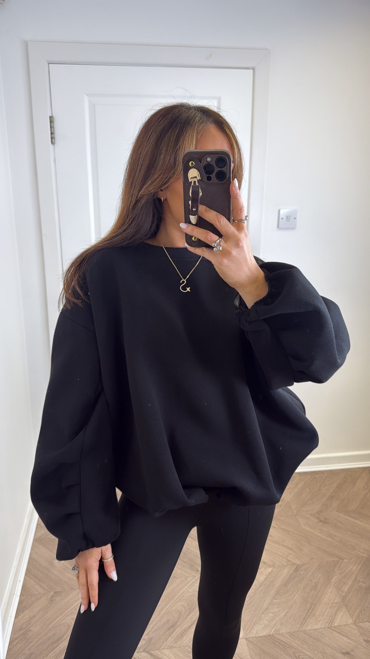 CARA black bubble hem sweatshirt