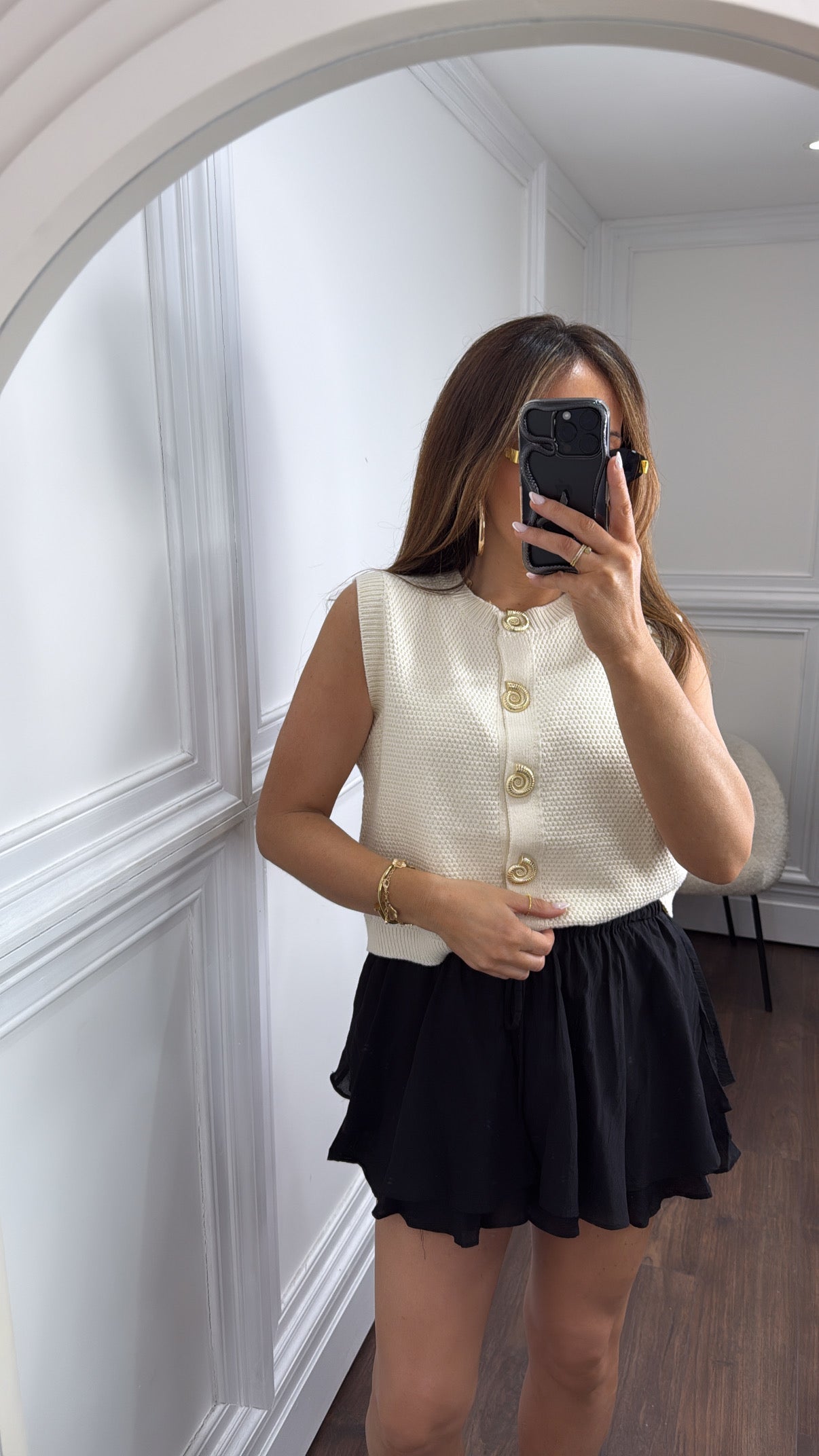 SHELLEY cream sleeveless cardigan with gold shell buttons
