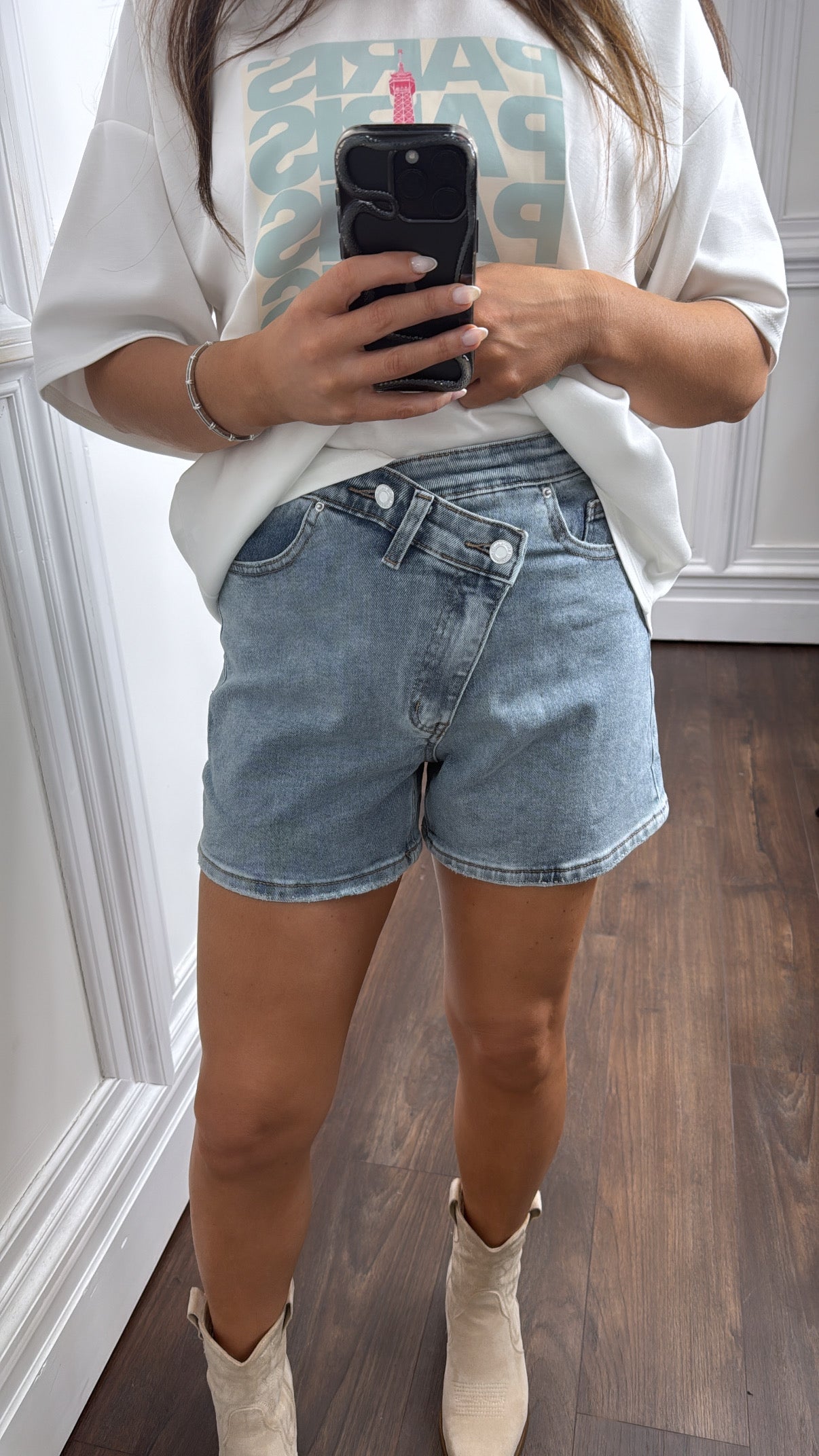 PORTER mid wash denim asymmetric shorts
