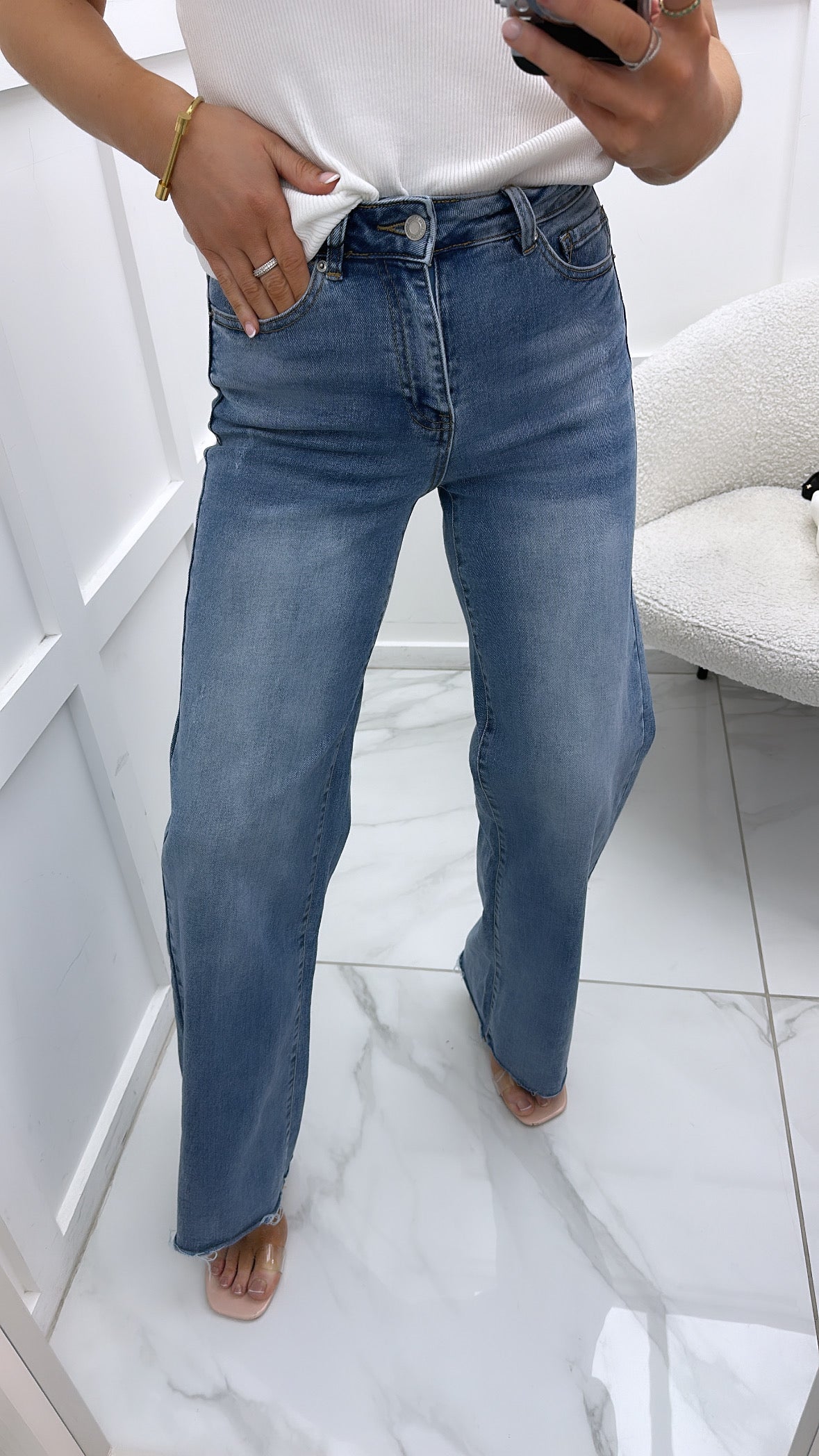 DANI blue denim wide leg frayed bottom jeans