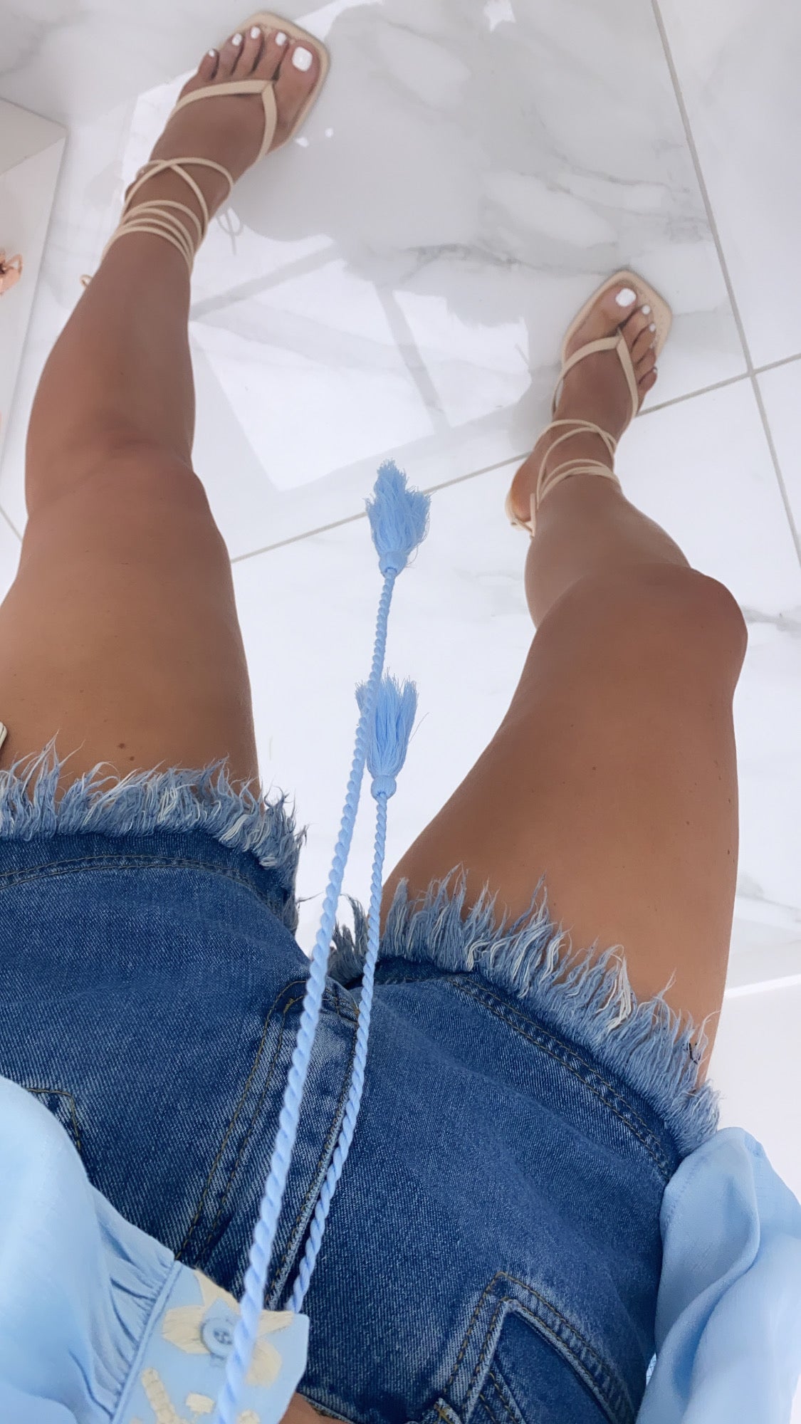 LUCIE mid wash distressed denim shorts